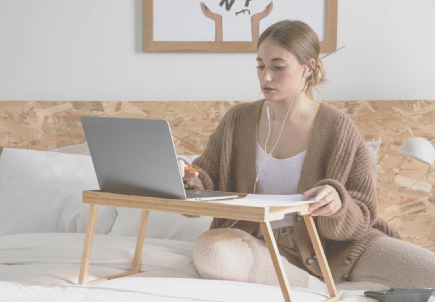 Designer reviewing interface components and design system documentation